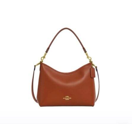 深夜求助！coach这两个包选哪一个呀！