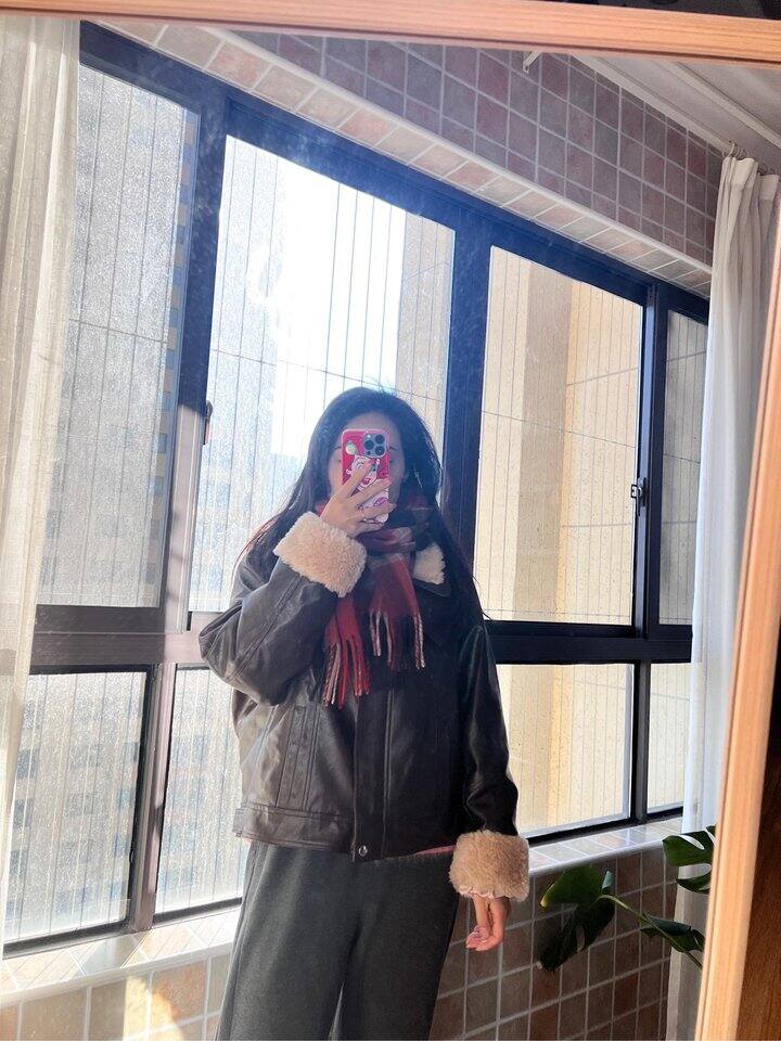 降温了穿上羽绒服了