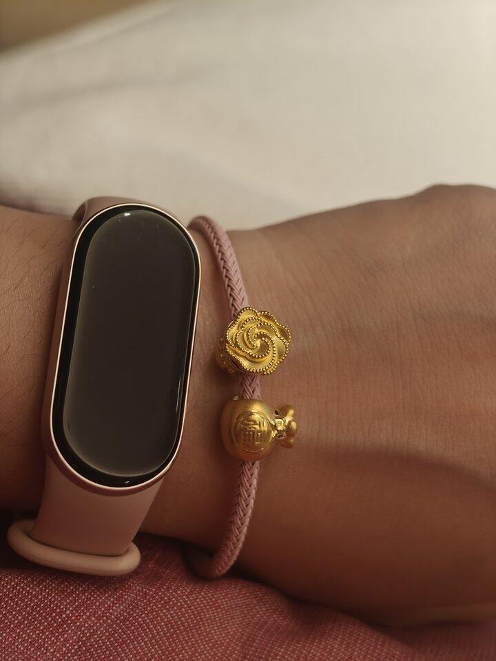 买了两颗周生生转运珠