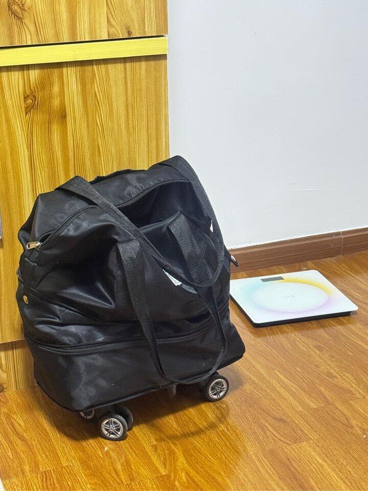 带上我的破烂行李袋破烂衣服去北京出差